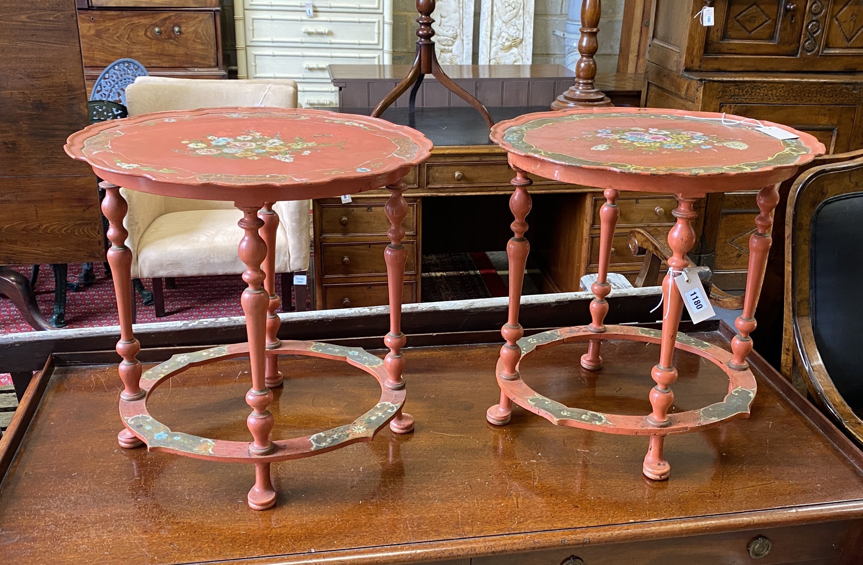 A pair of oval floral painted occasional tables, width 49cm, depth 42cm, height 49cm
